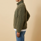 Side view of the olive green Amélie Sherpa-Fleece Stand-Collar Jacket for Women featuring a stand collar, full zip, and plush fleece texture.