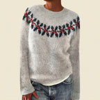 Front view of the gray Béatrix Reindeer-Print Crew-Neck Sweater featuring a festive reindeer print, classic crew neckline, long sleeves, and cozy knit fabric.
