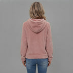 Back view of the Céleste Hoodie Sherpa Drawstring in pink, highlighting the soft sherpa fabric, cozy hood, long sleeves, and relaxed comfortable fit.