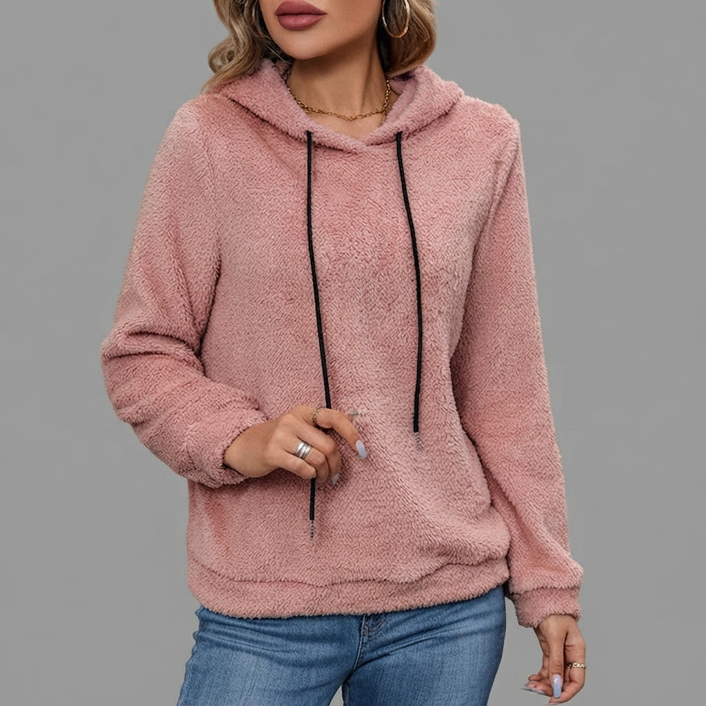 Front close-up view of the Céleste Hoodie Sherpa Drawstring in pink, highlighting the soft sherpa texture, cozy hood, adjustable drawstring, and detailed front design.