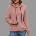 Front close-up view of the Céleste Hoodie Sherpa Drawstring in pink, highlighting the soft sherpa texture, cozy hood, adjustable drawstring, and detailed front design.