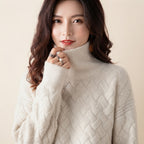 Charlotte Sweater Turtleneck Cable-Knit in cream color, front close-up view, highlighting the cable-knit texture, high turtleneck neckline, and soft cozy knit design.
