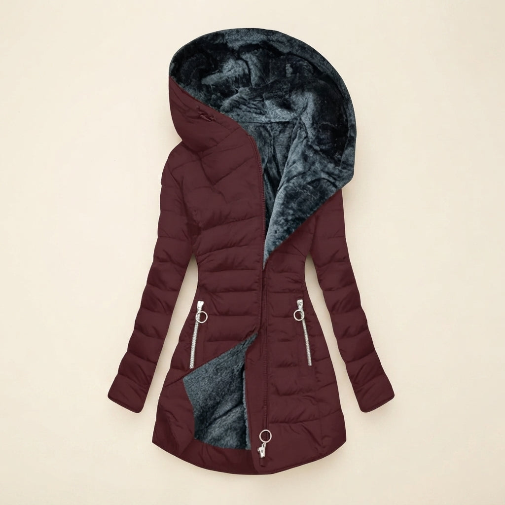 Front view showcasing the Clara puffer jacket in red, featuring a cozy faux-fur-lined hood, quilted body, full-zip front closure, long sleeves, and a warm, comfortable silhouette.