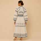 Cordelia geometric-print belted midi dress with long sleeves, back view, designed by Bella Hudson