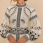 Cordelia geometric-print belted midi dress, close-up detail view, designed by Bella Hudson