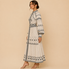 Cordelia geometric-print belted midi dress with long sleeves, side view, designed by Bella Hudson