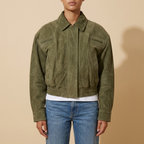 Front view of the olive green Elodie Suede-Look Cropped Long-Sleeve Jacket featuring a point collar, zip front, and cropped hem.