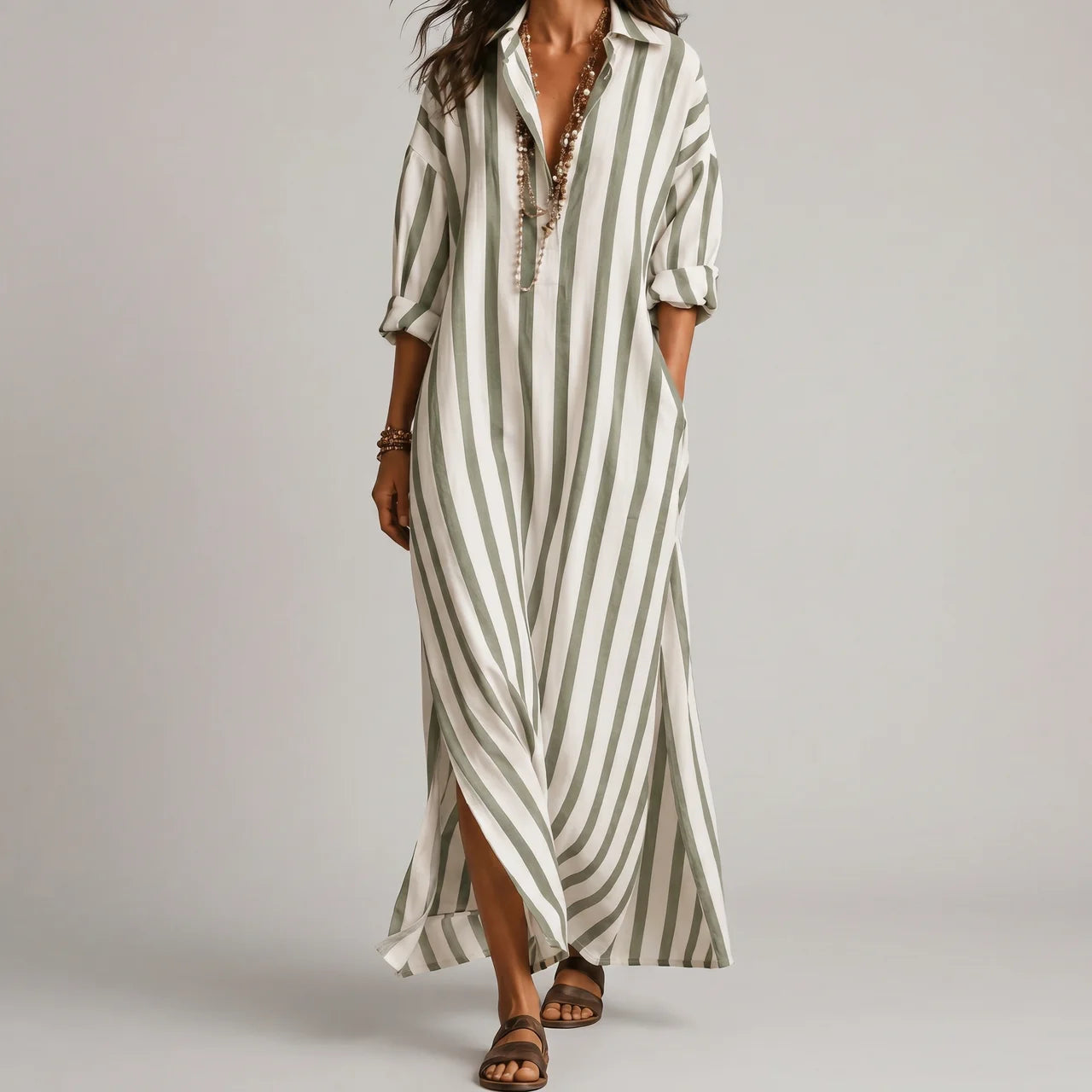 Green maxi dress with rolled sleeves and side pockets front view BELLA HUDSON