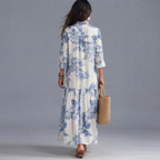 Ines Floral-Print Tiered Button-Down Maxi Dress in White and Blue shown in back view with elegant flowing design.