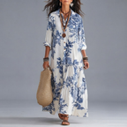Ines Floral-Print Tiered Button-Down Maxi Dress in White and Blue shown in front view with flowing tiered silhouette.