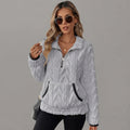 Dark grey fleece pullover with a half-zip neckline, displayed from the front.