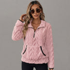 Pink fleece top with a cozy half-zip neckline, shown from the front.