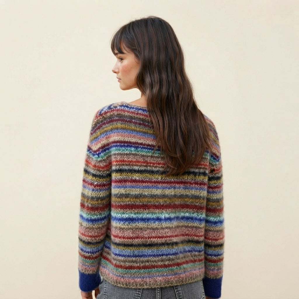 Back side view of the Isaure Sweater Striped Crew-Neck featuring a multi-color striped pattern, classic crew neckline, long sleeves, and soft knit construction. The back profile showcases the sweater’s clean, comfortable silhouette and relaxed everyday fit.