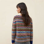 Back side view of the Isaure Sweater Striped Crew-Neck featuring a multi-color striped pattern, classic crew neckline, long sleeves, and soft knit construction. The back profile showcases the sweater’s clean, comfortable silhouette and relaxed everyday fit.