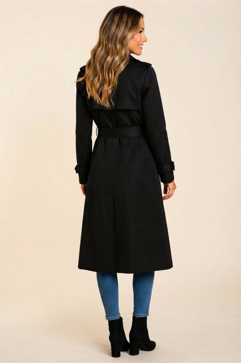 Back side view highlighting the black wool-blend fabric, structured trench coat shape, long sleeves, defined waist, and clean back detailing.