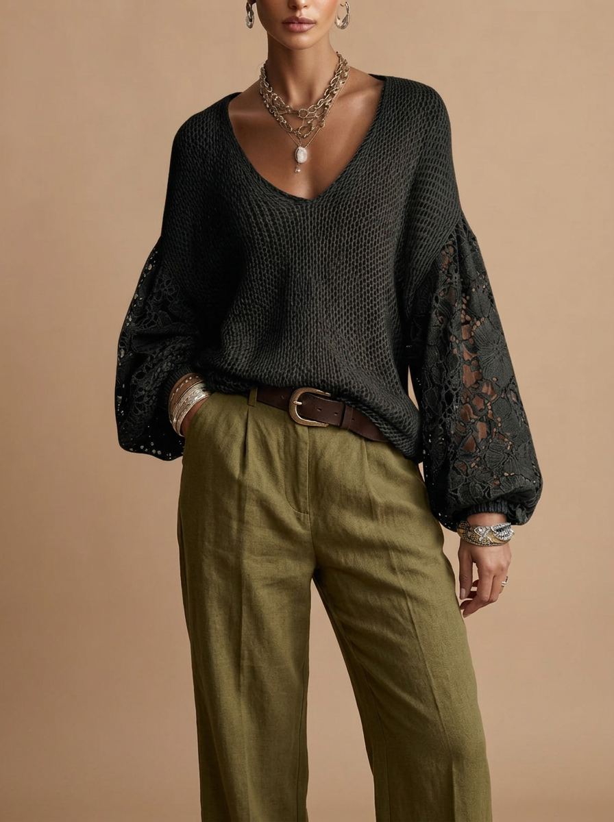 Front view of the Josefine Sweater Lace V-Neck Knit in Black, featuring a delicate lace V-neckline, soft knit fabric, and long sleeves. Designed by Bella Hudson.