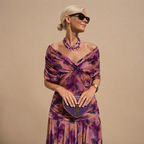 Odalys Evening Maxi Dress Wrapped V-Neck in Purple shown in front view with elegant maxi silhouette and wrapped V-neckline.