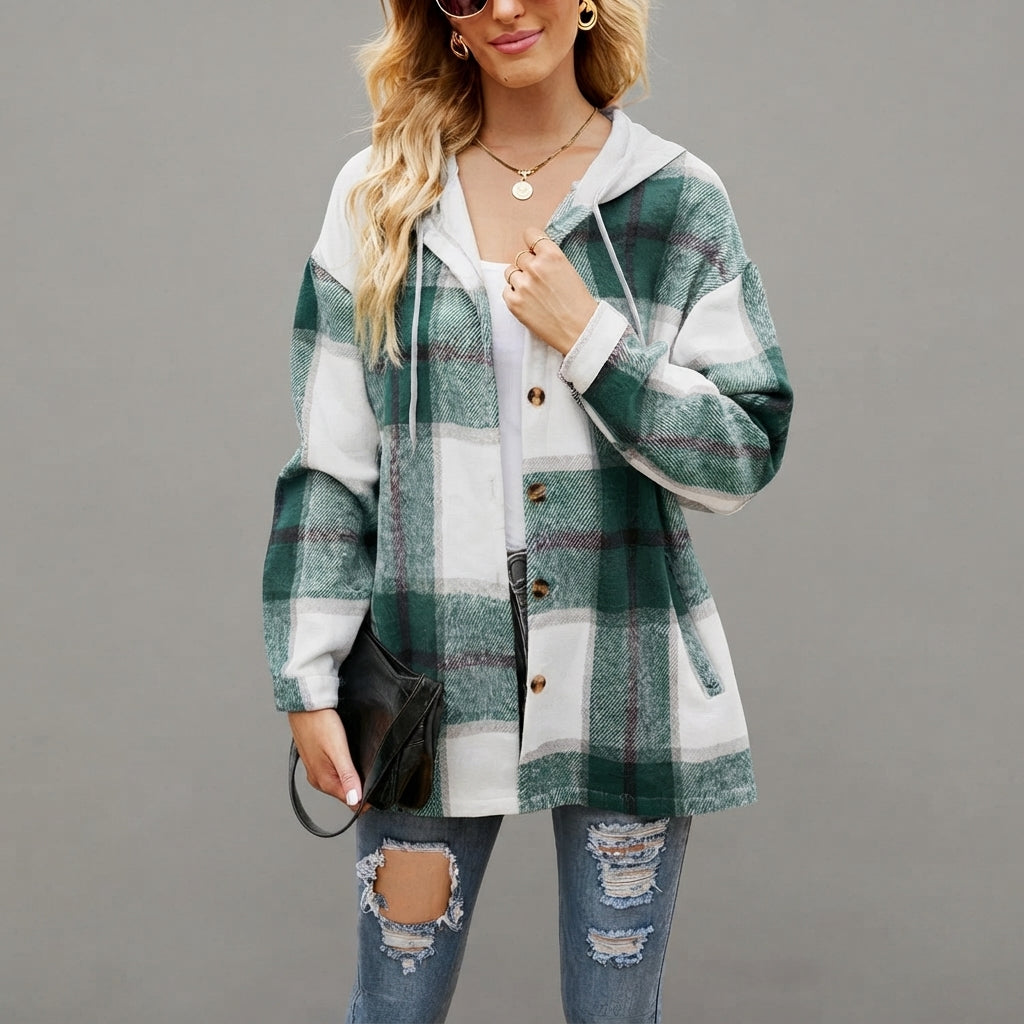 Front view of the Odalys women's Grün red plaid flannel hooded shacket featuring a classic plaid pattern, cozy hood, button-front closure, long sleeves, and relaxed fit.