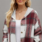 Front close-up of the Odalys women's red plaid flannel hooded shacket highlighting the classic plaid pattern, soft flannel texture, hood, and button-front details.