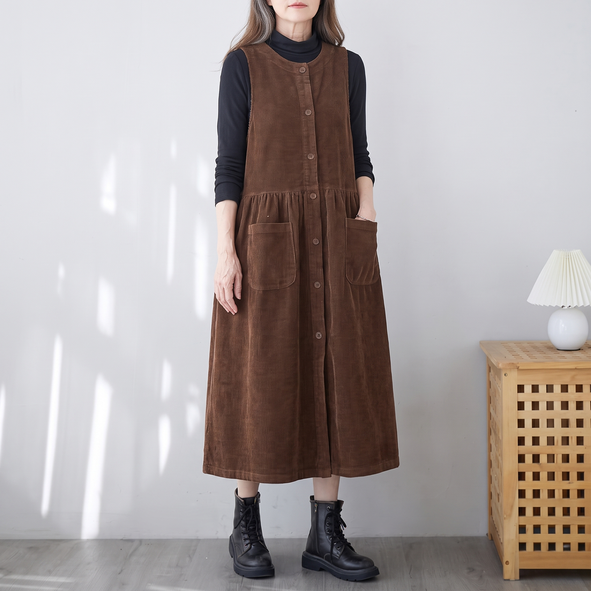 Phoebe Brown corduroy pinafore midi dress with sleeveless A-line shape and front pockets