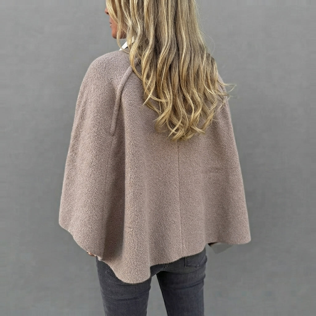 Rosamée beige wool-blend button-front jacket shown from the back view, highlighting its clean classic silhouette, soft wool-blend texture, long sleeves, and comfortable fit.