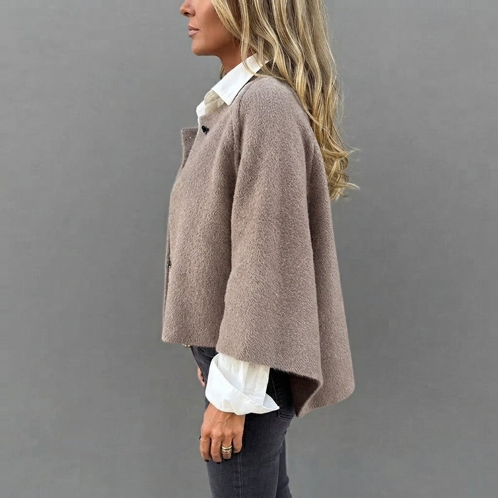 Rosamée beige wool-blend button-front jacket shown from the side view, highlighting its comfortable fit, long sleeves, soft wool-blend texture, and classic jacket silhouette.