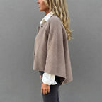 Rosamée beige wool-blend button-front jacket shown from the side view, highlighting its comfortable fit, long sleeves, soft wool-blend texture, and classic jacket silhouette.