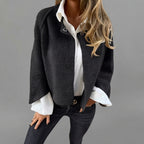 Rosamée black wool-blend button-front jacket shown from the front view, featuring a classic button-front closure, long sleeves, practical front pockets, and a comfortable timeless silhouette.