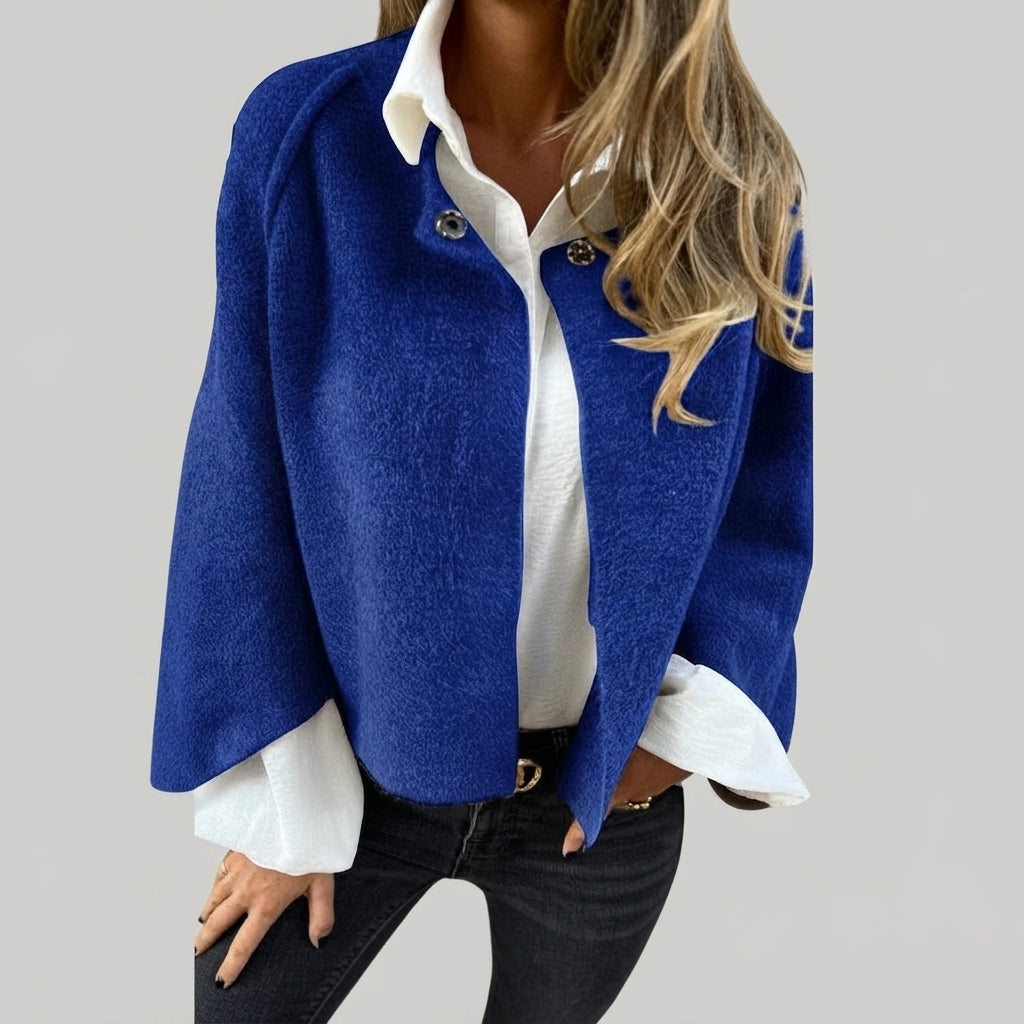 Rosamée blue wool-blend button-front jacket shown from the front view, featuring a classic button-front closure, long sleeves, practical front pockets, and a comfortable timeless silhouette.