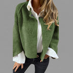 Rosamée green wool-blend button-front jacket shown from the front view, featuring a classic button-front closure, long sleeves, practical front pockets, and a comfortable timeless silhouette.