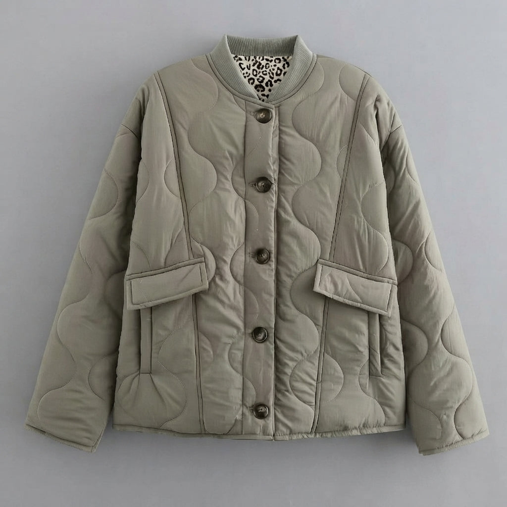 Front view of the Sylvaine Jacket Quilted Leopard-Trim in grey, featuring a quilted design, stylish leopard-print trim, and a comfortable everyday silhouette.