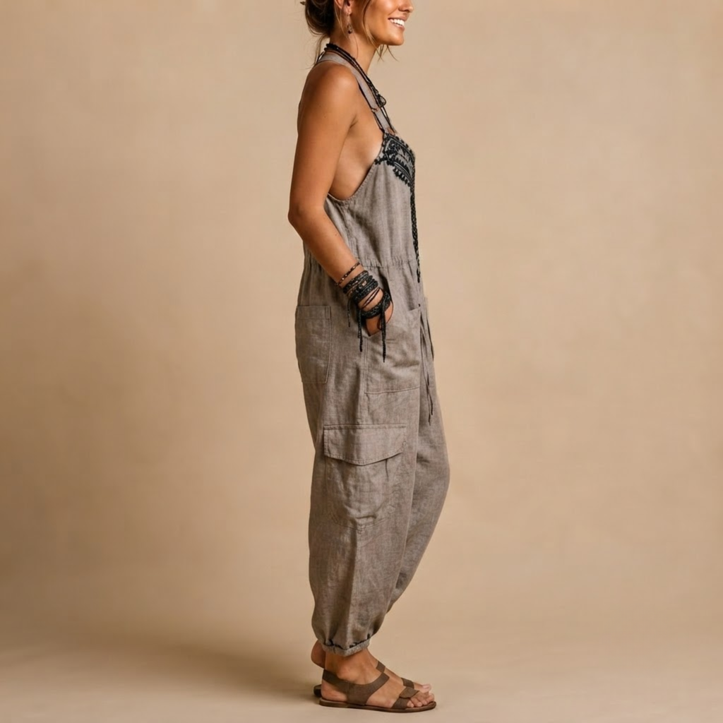 Théa Lightweight Embroidered Bohemian Jumpsuit in Grey shown in side view.