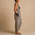 Théa Lightweight Embroidered Bohemian Jumpsuit in Grey shown in side view.