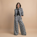 Valentina Frayed Jacket and Pants Two-Piece Set in Black shown in front view with frayed trim jacket and matching pants.