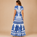 Wilhelmina printed maxi dress with elastic waist in light blue, back view, designed by Bella Hudson
