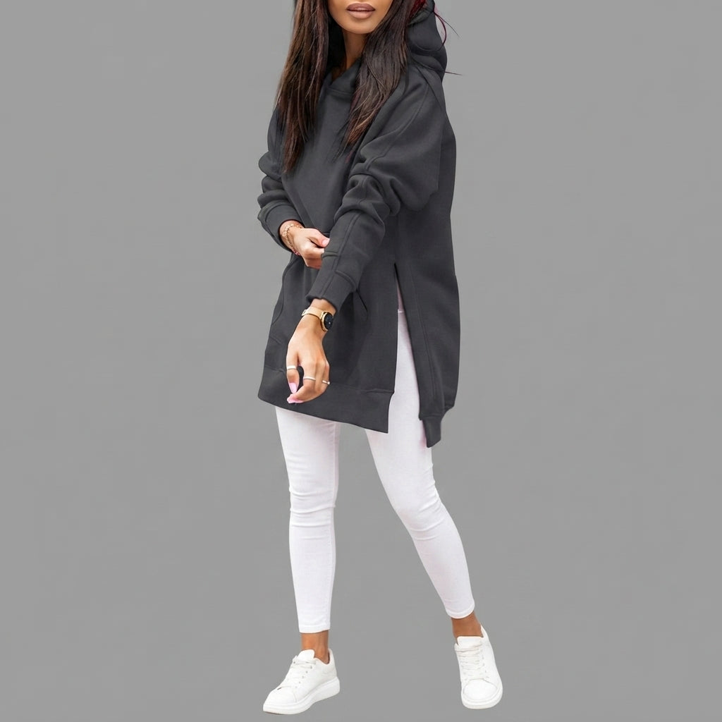 Front view of the Wilhelmine oversized side-slit hoodie in light black, featuring a relaxed oversized fit, cozy hood, long sleeves, and modern side-slit detailing.