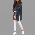 Front view of the Wilhelmine oversized side-slit hoodie in light black, featuring a relaxed oversized fit, cozy hood, long sleeves, and modern side-slit detailing.