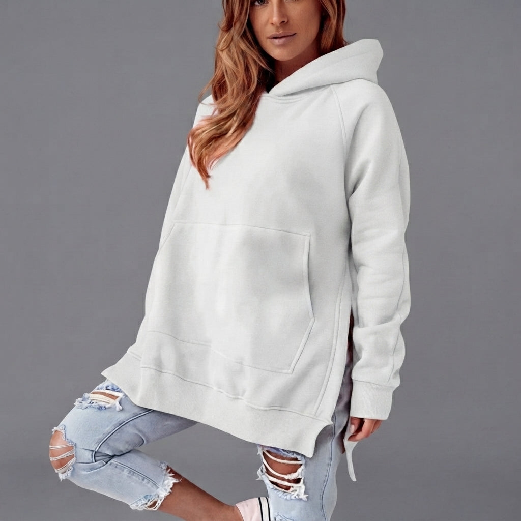 Front view of the Wilhelmine oversized side-slit hoodie in white, featuring a relaxed oversized fit, cozy hood, long sleeves, and stylish side-slit detailing.