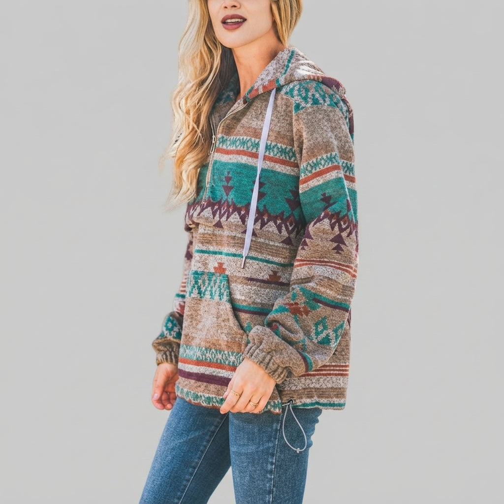 Front view of the brown red Zephira Hoodie Aztec-Print Half-Zip, featuring a bold Aztec print, attached hood, long sleeves, and half-zip front closure.
