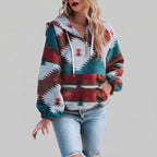 Front view of the red Zephira Hoodie Aztec-Print Half-Zip, featuring a bold Aztec print, attached hood, long sleeves, and half-zip front closure.