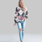 Front view of the rosa red Zephira Hoodie Aztec-Print Half-Zip, featuring a bold Aztec print, attached hood, long sleeves, and half-zip front closure.