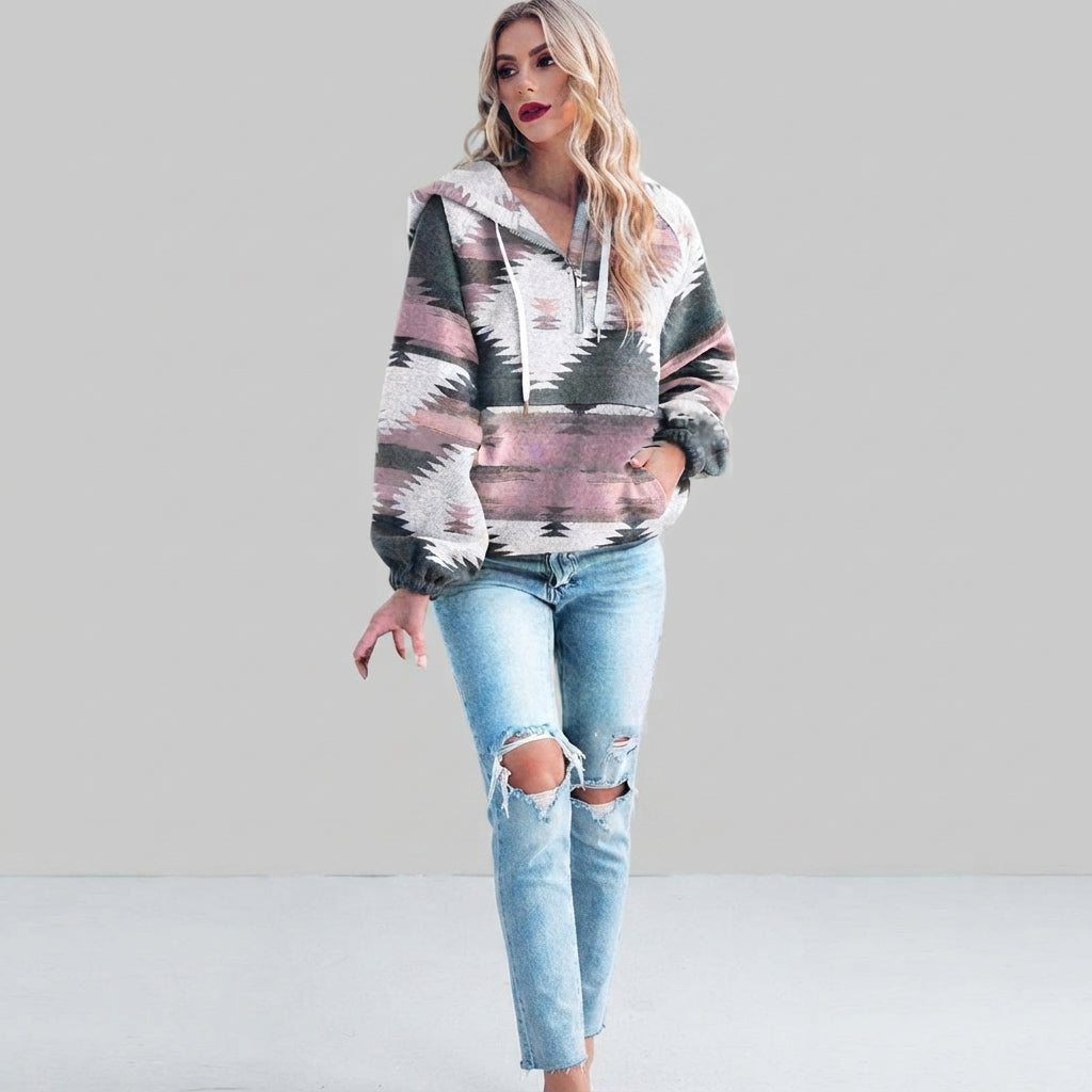 Front view of the rosa red Zephira Hoodie Aztec-Print Half-Zip, featuring a bold Aztec print, attached hood, long sleeves, and half-zip front closure.