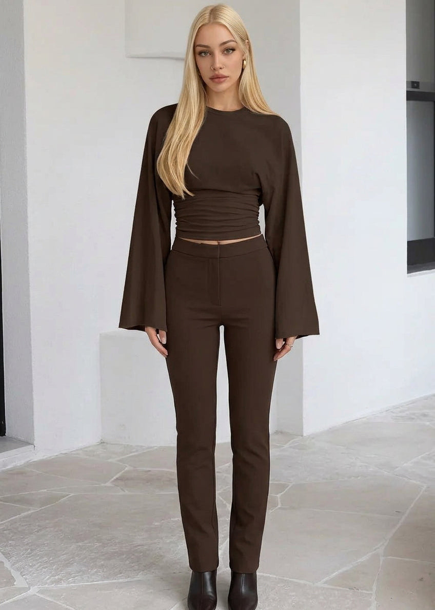 Alina Brown ruched-waist top featuring a crew neckline, fitted silhouette, long wide sleeves, and gathered waist