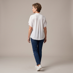 Back view of the Amandine Blouse V-Neck Flowy Short-Sleeve in white, highlighting the relaxed silhouette, lightweight fabric, and clean back design. Designed by Bella Hudson.