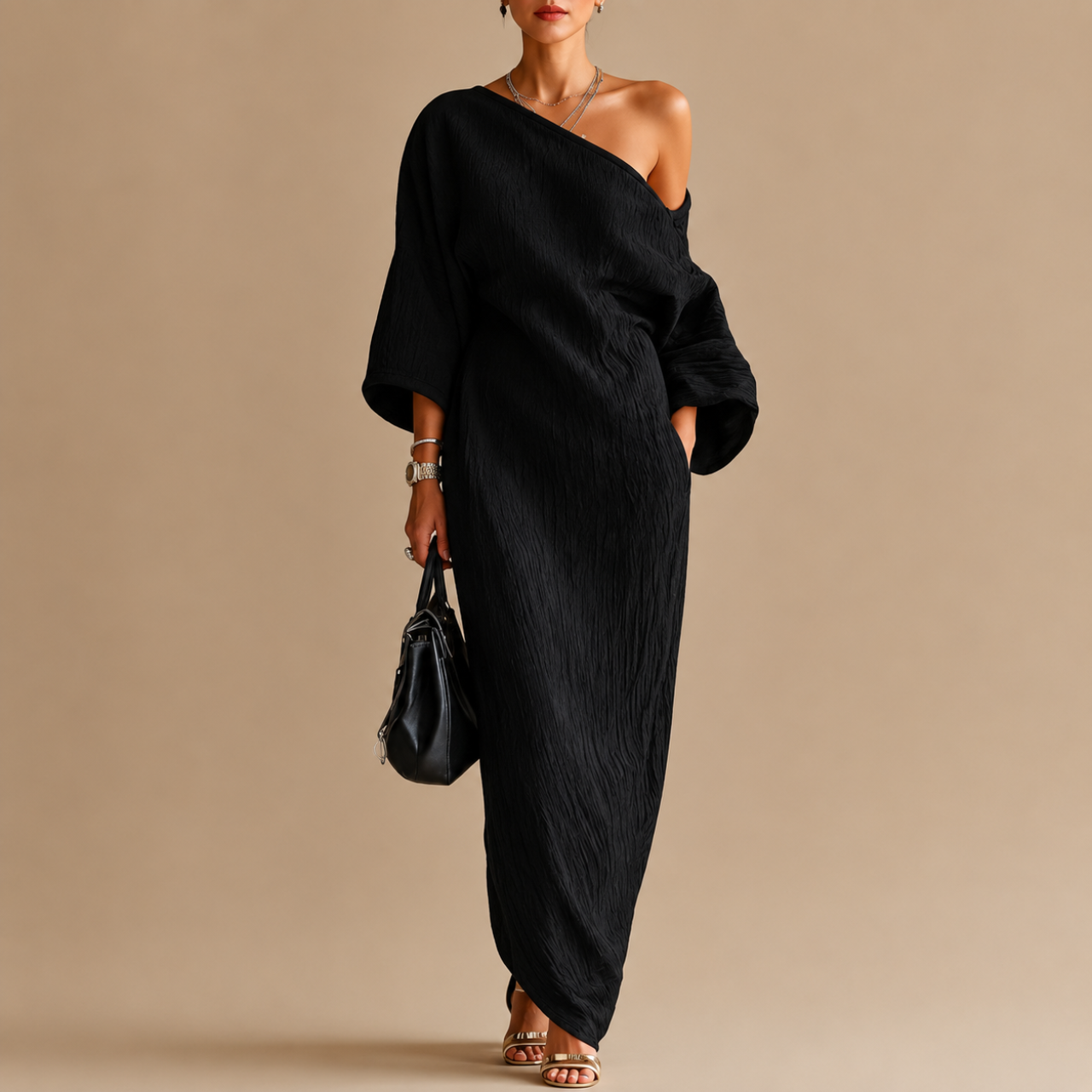 Amara Maxi Dress One-Shoulder Linen in black front view featuring a sophisticated one-shoulder design and relaxed textured linen silhouette, designed by Bella Hudson.