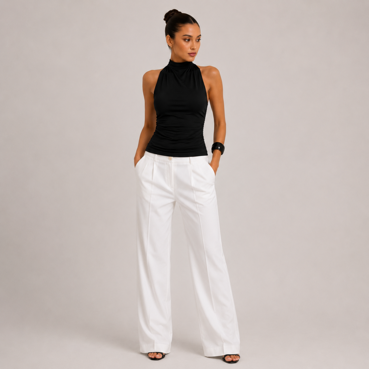 Amelia Halter Neck Open Back Tank Top in Black showcasing ruched fabric detail and premium stretch fit, designed by BELLA HUDSON