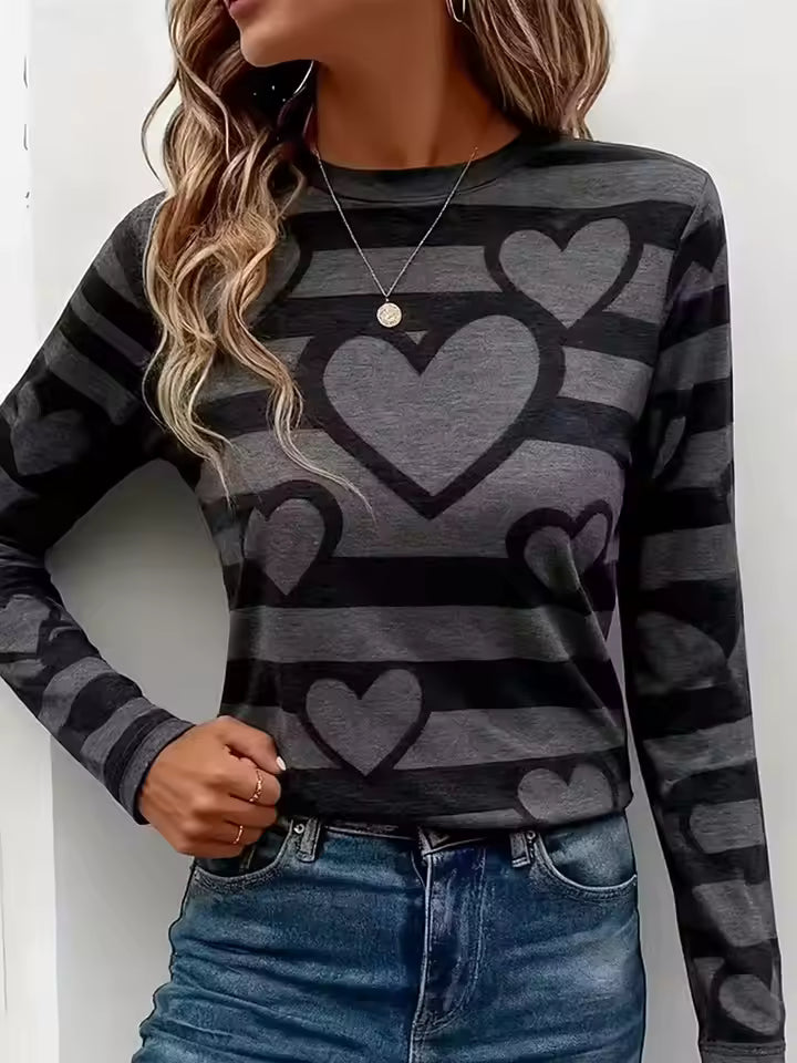 Amelia heart-print striped T-shirt with a crew neckline, long sleeves, layered heart graphics, and a relaxed fit