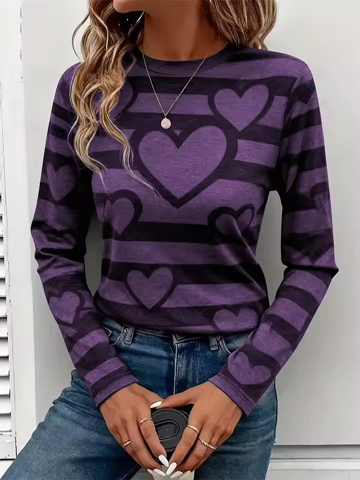 Amelia Purple long-sleeve T-shirt with horizontal stripes, layered heart graphics, crew neckline, and relaxed fit