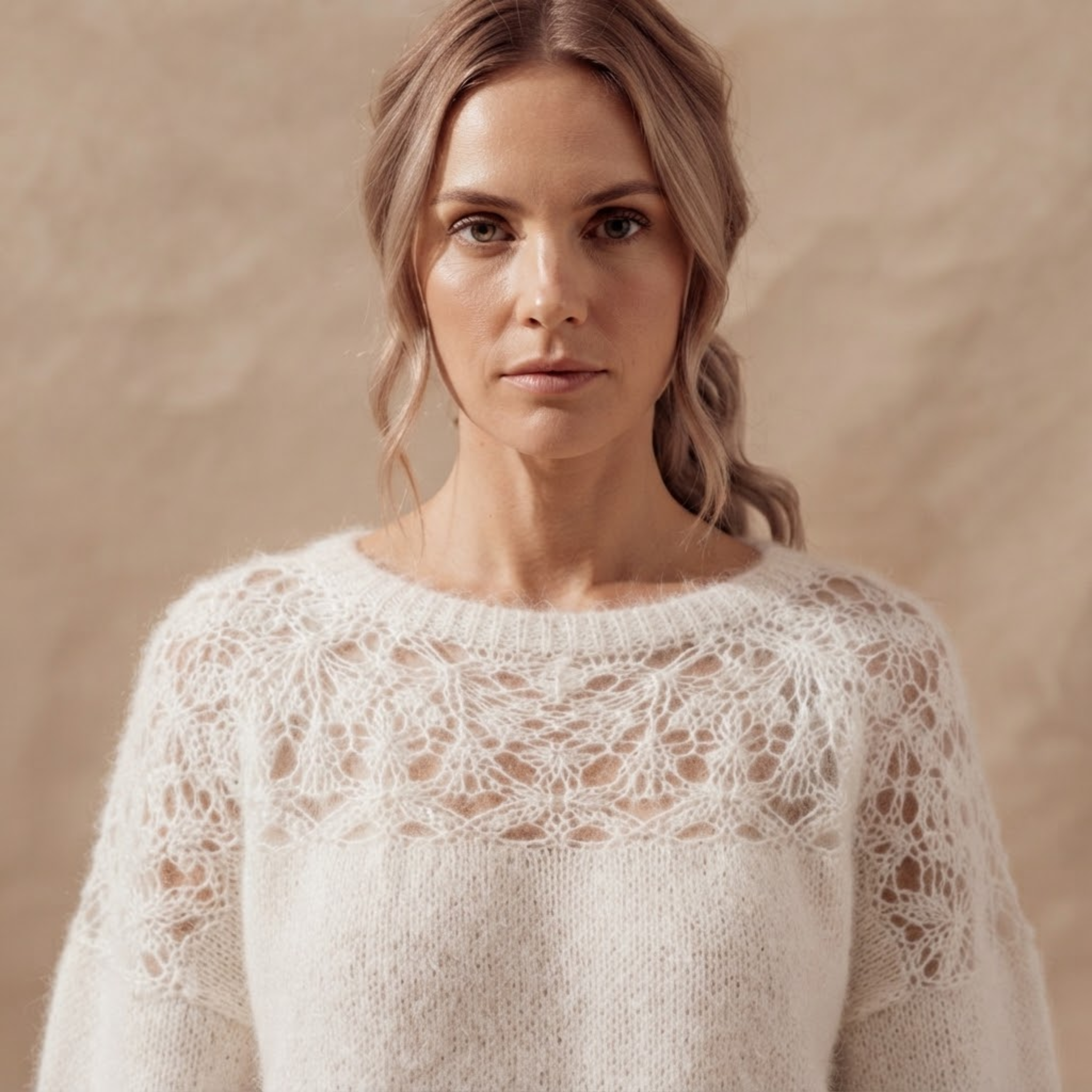 Close-up front view of the Anouk Sweater Open-Knit Lace-Sleeve in White, showcasing the knit texture and lace sleeve details.