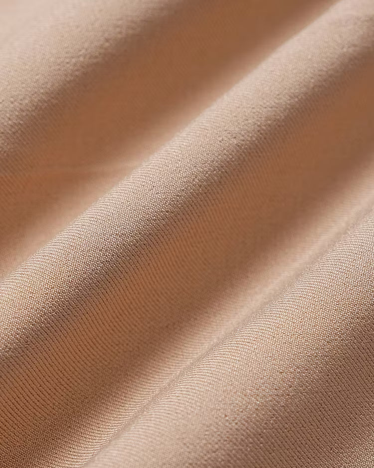 Anwen Khaki fabric close-up showing the fine twill texture.